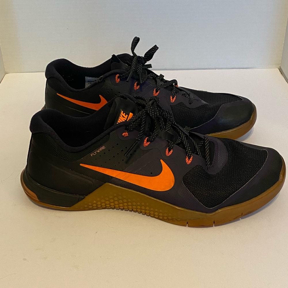 Nike Metcon 2 Flywire. Size Men’s 12. Color. Black And Purple With Orange Swoosh